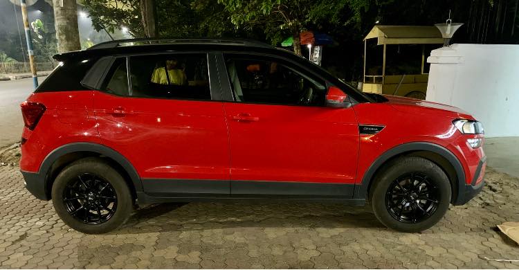 skoda kushaq side profile red black double tone